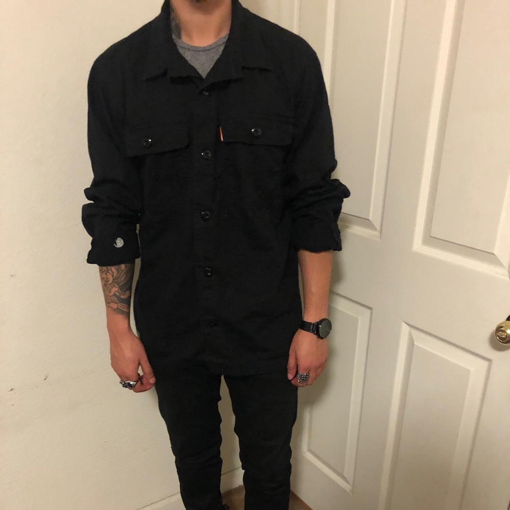 Black shirt jacket.